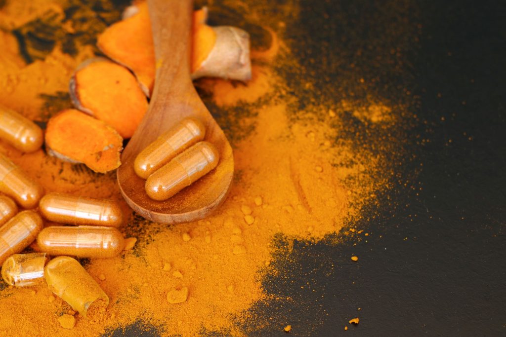 Turmeric capsule with powder